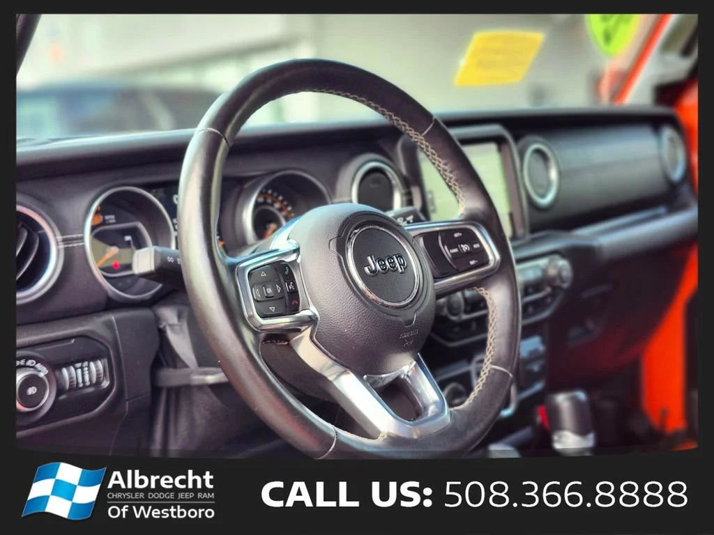 Used 2020 Orange Jeep Unlimited Sahara image 18