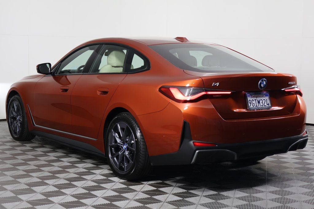 Certified Used 2023 Sunset Orange Metallic BMW eDrive35 image 6