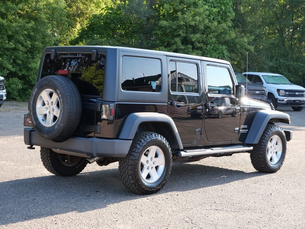 Used 2013 Black Jeep Unlimited Sport image 6