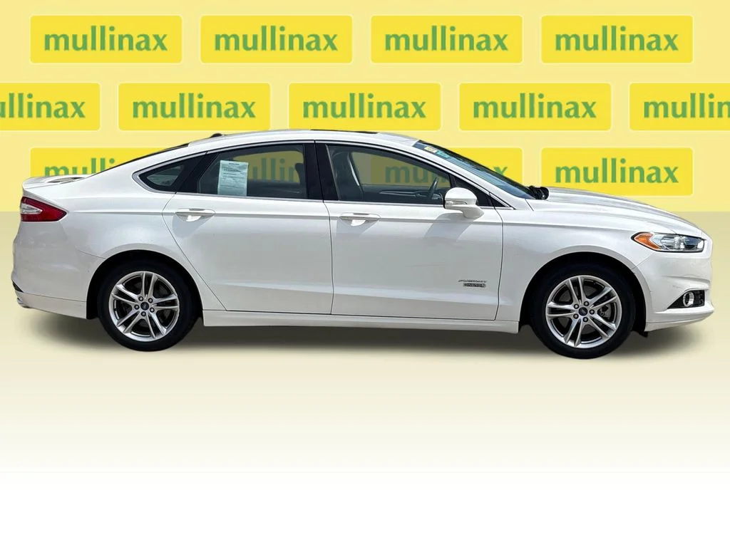 Used 2015 Ford Fusion Energi Titanium with VIN 3FA6P0SU5FR172903 for sale in New Smyrna Beach, FL