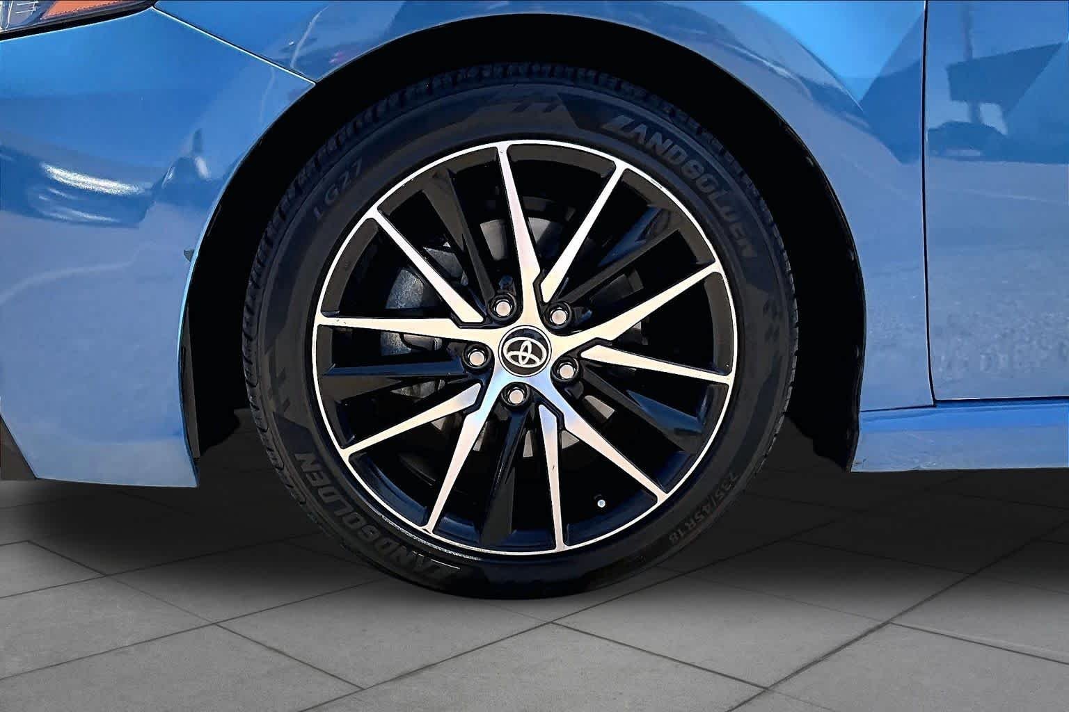 Used 2023 Cavalry Blue Toyota SE image 11
