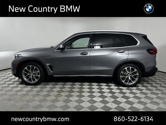 Used 2026 Skyscraper Grey Metallic BMW xDrive50e image 4