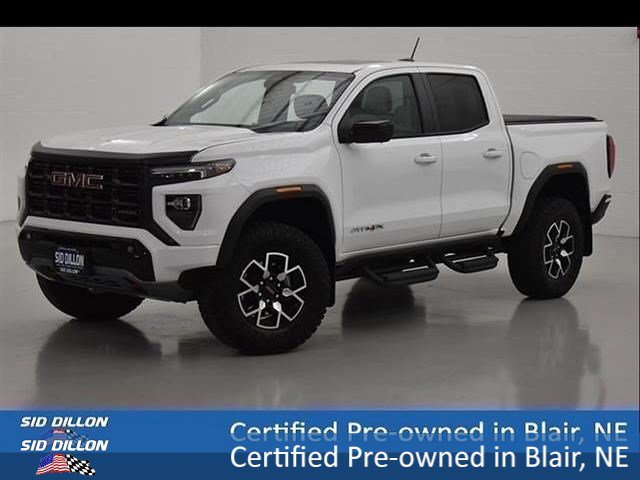 Certified Used 2024 Summit White GMC 4WD AT4X image 1