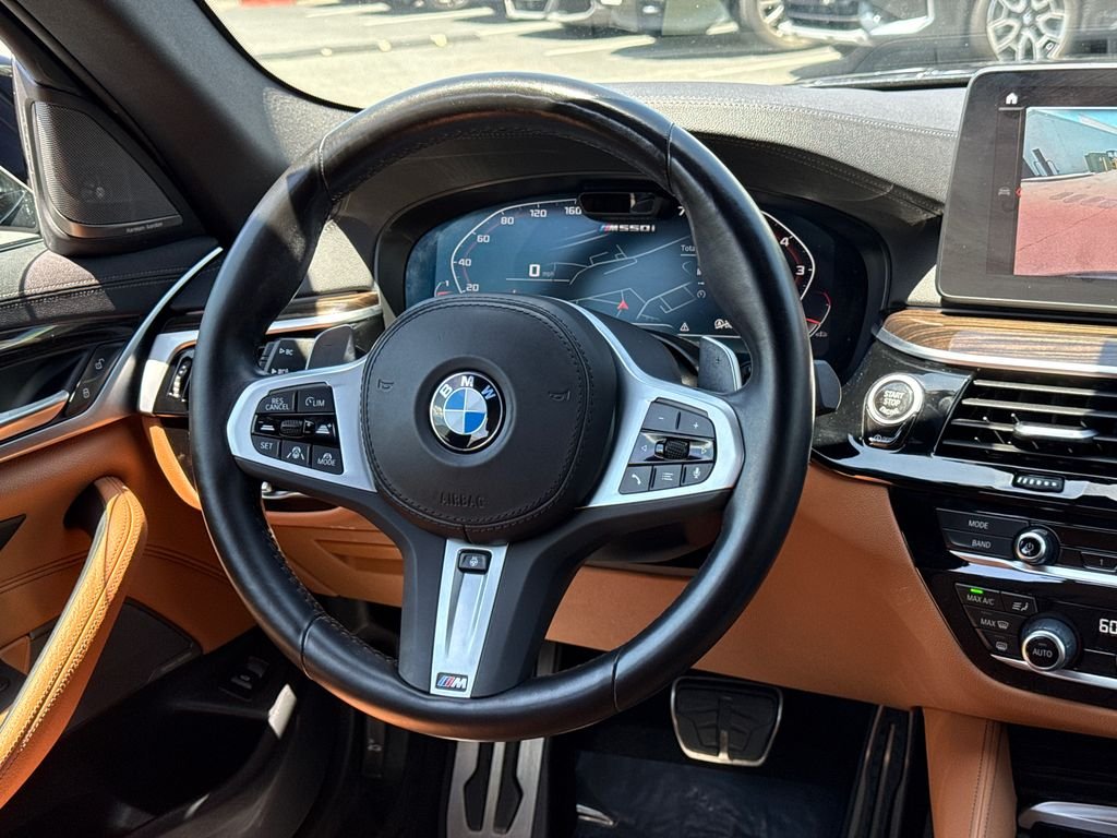 Used 2023 Black BMW M550i xDrive image 22