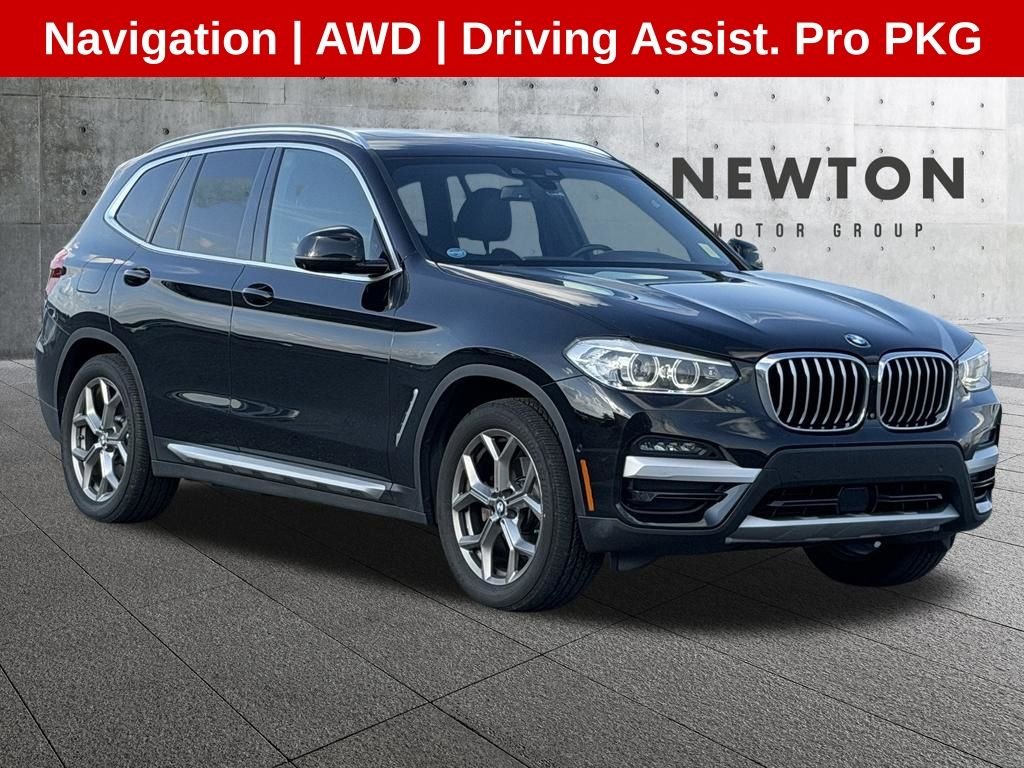 Used 2021 Black BMW xDrive30i image 1