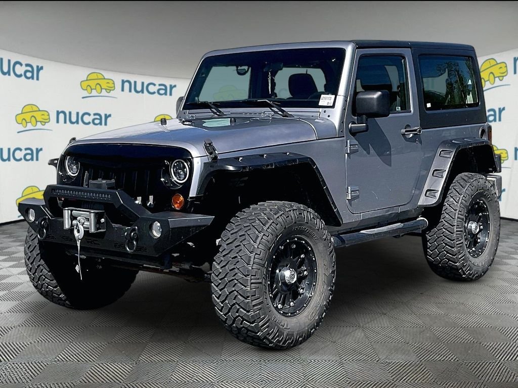 Used 2013 Billet Metallic Clearcoat Jeep Sport image 2
