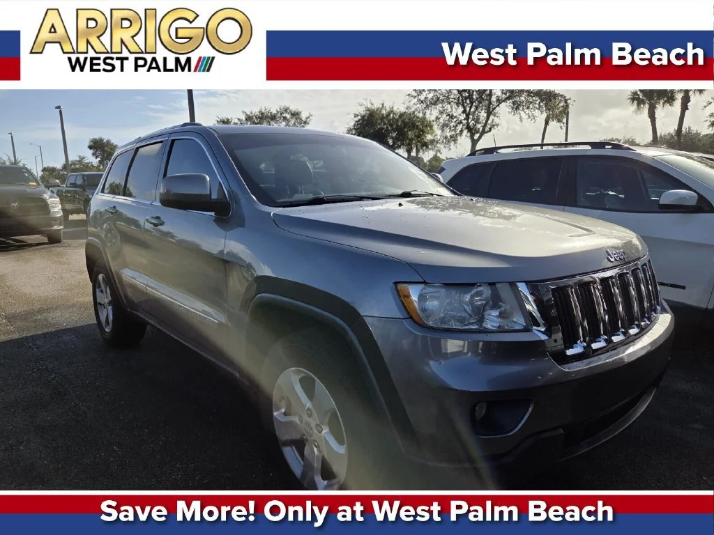 Used 2011 Mineral Gray Metallic Jeep Laredo image 1