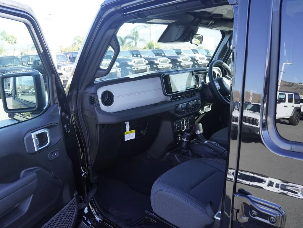 New 2026 black clearcoat Jeep Sport RHD image 27