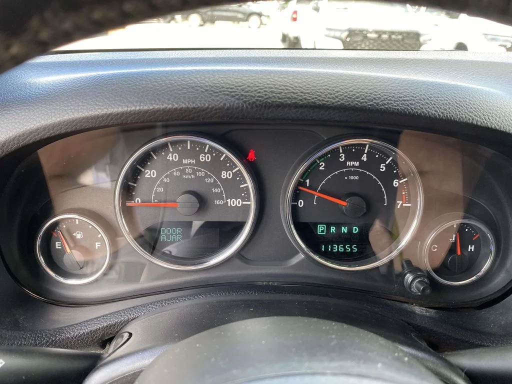 Used 2013 Silver Jeep Sport image 29
