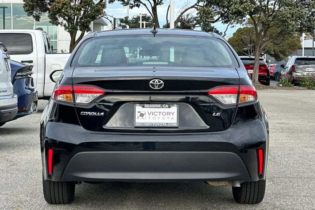 Used 2025 Midnight Black Metallic Toyota LE image 5