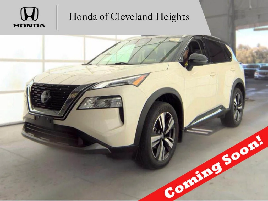 Used 2023 Pearl White Nissan SL image 1