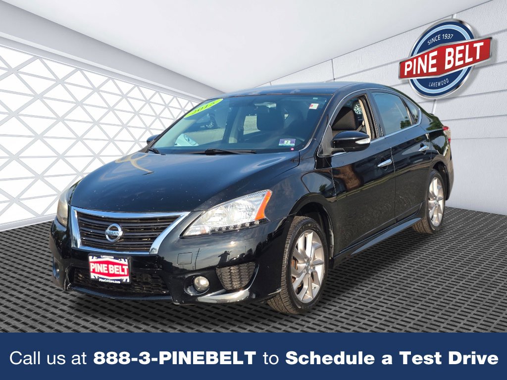 Used 2015 Super Black Nissan SR image 1