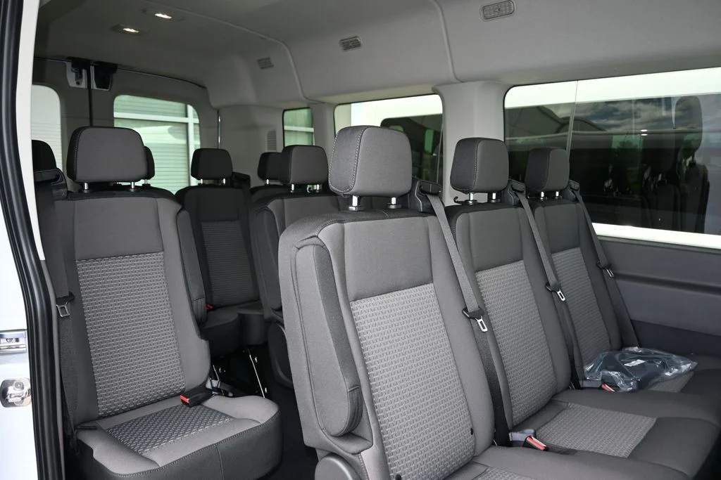 New 2026 Oxford White Ford Passenger Van XLT image 14