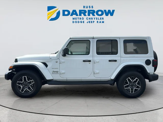 Used 2024 White/off-white Jeep Sahara image 2
