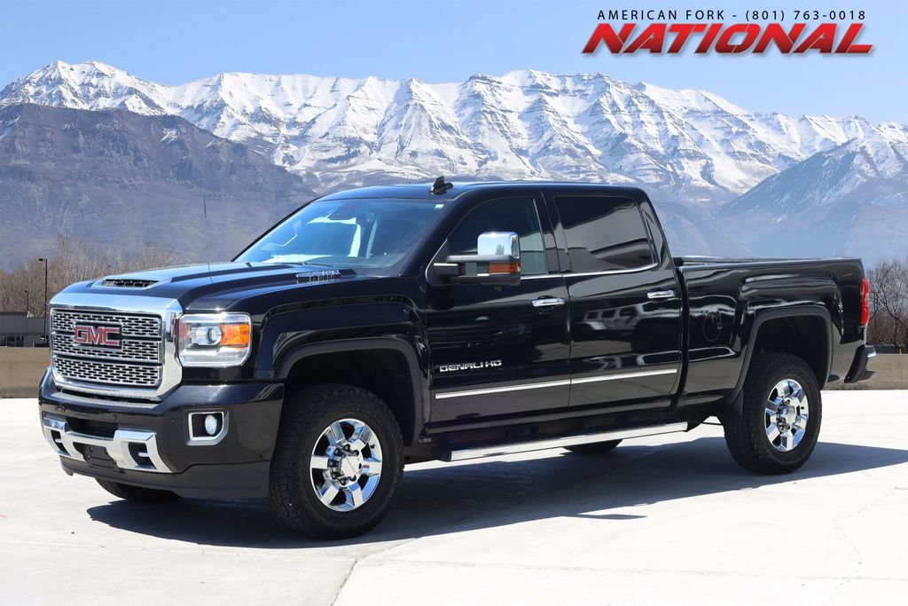 Used 2018 ONYX BLACK GMC Denali image 1