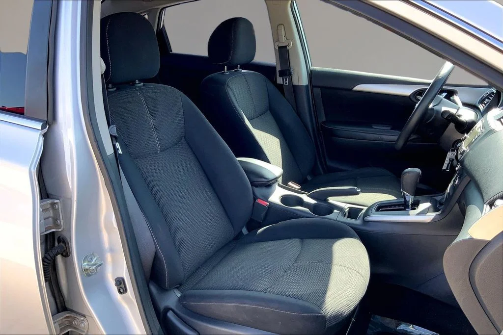 Used 2018 Brilliant Silver Metallic Nissan S image 7