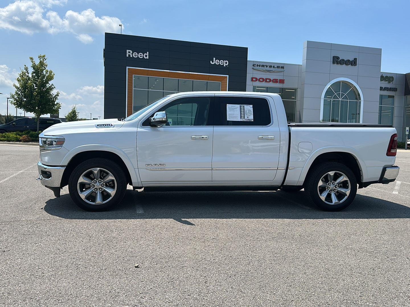 Used 2021 RAM Ram 1500 Pickup Limited with VIN 1C6SRFHT3MN539986 for sale in Kansas City