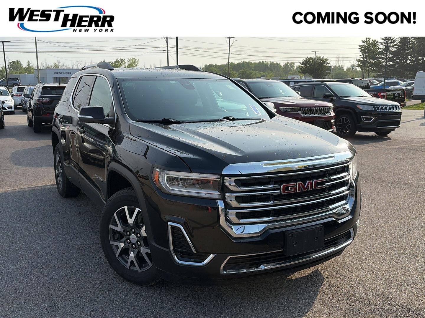 Used 2021 Ebony Twilight Metallic GMC SLE image 1