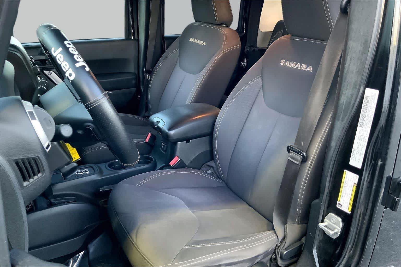 Used 2016 Black Clearcoat Jeep Sahara image 7