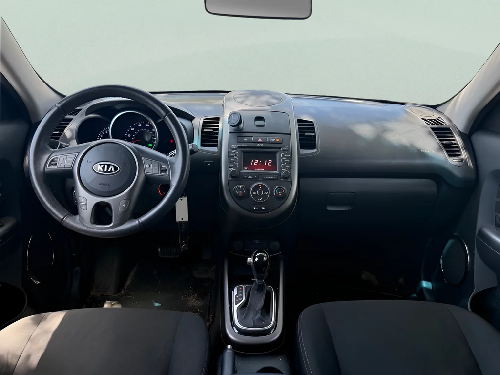 Used 2012 Clear White Kia Plus image 12