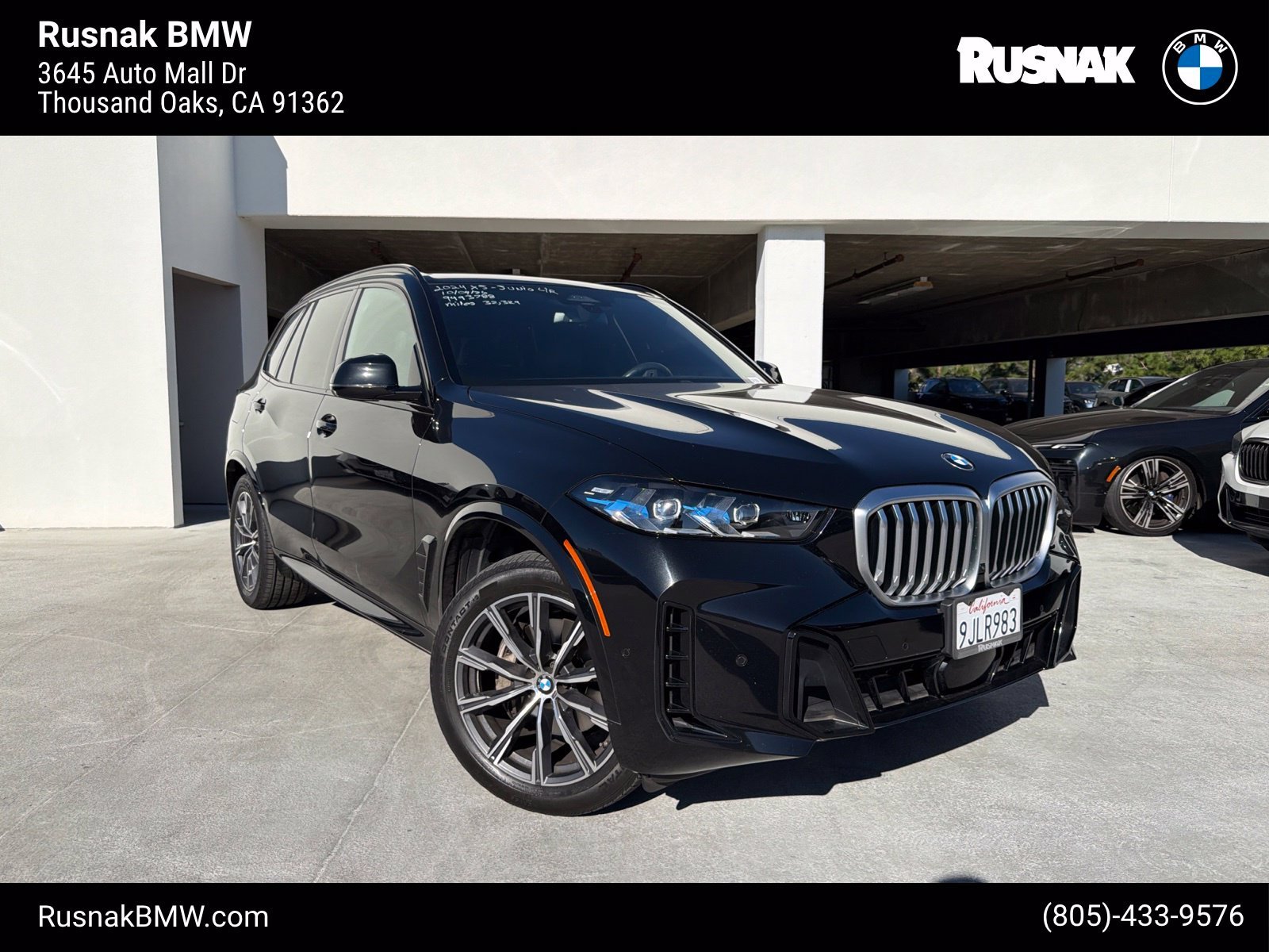 Used 2024 Black Sapphire Metallic BMW sDrive40i image 1