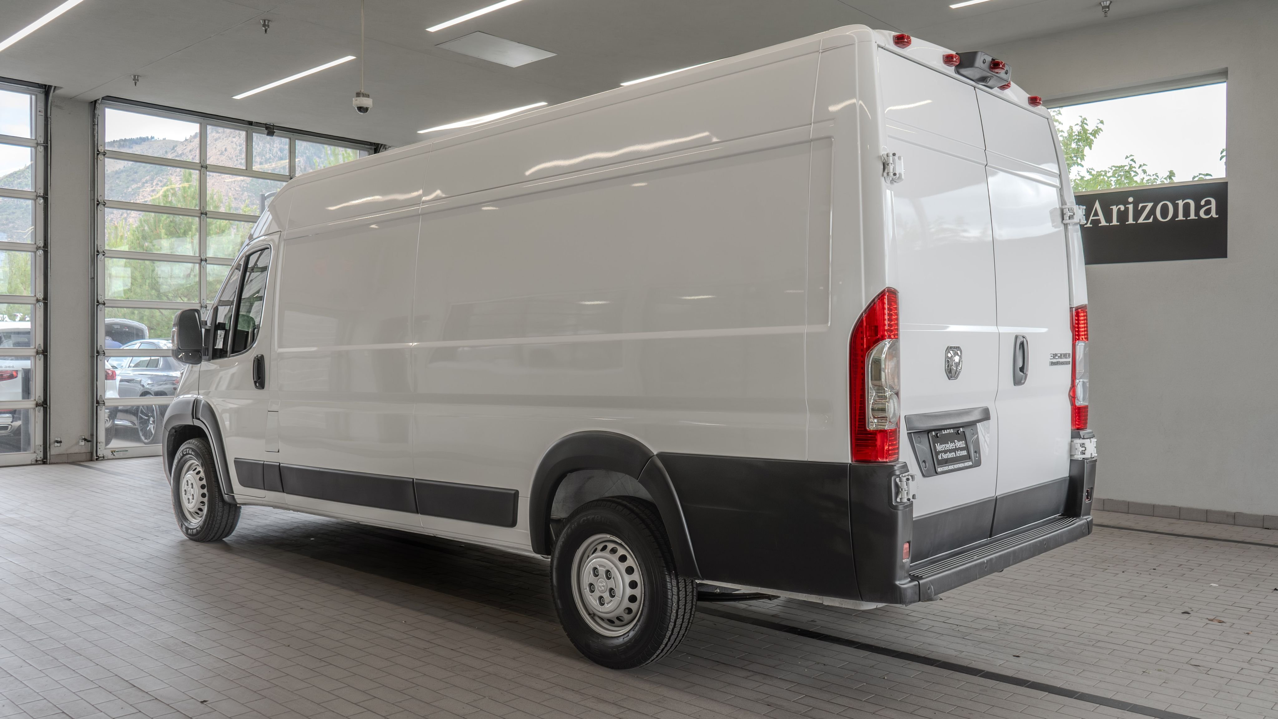 Used 2024 Bright White Clearcoat Ram High Roof image 13