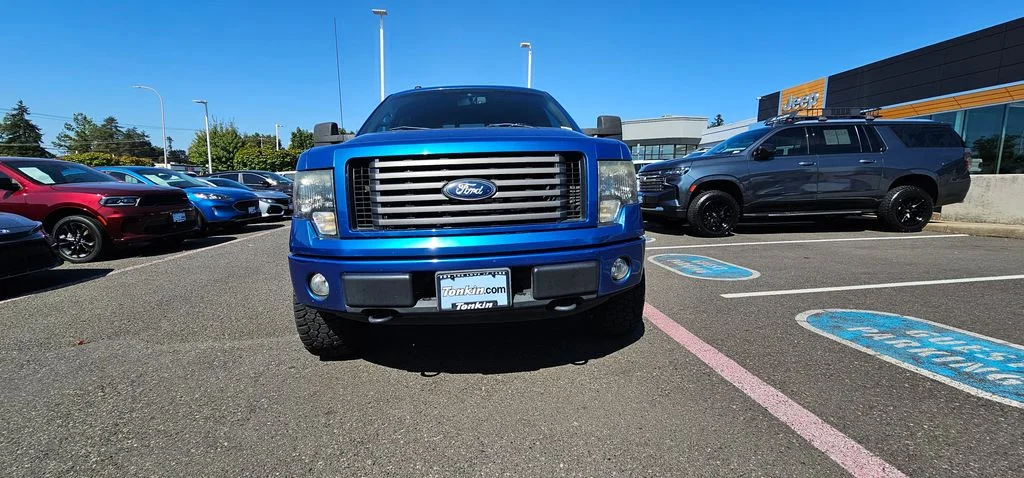 Used 2011 Blue Flame Metallic Ford FX4 image 4