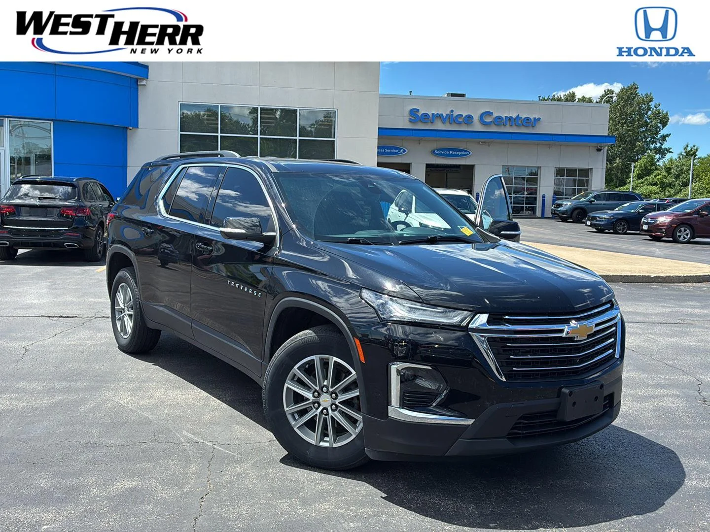 Used 2023 Mosaic Black Metallic Chevrolet LT Cloth image 1