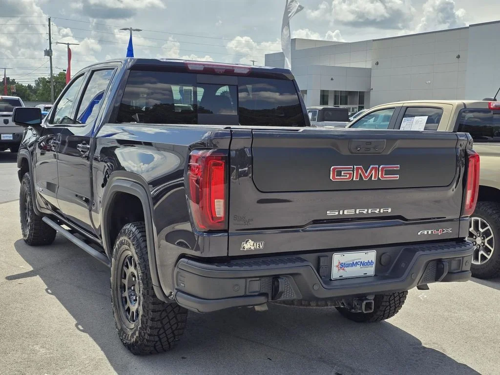 Used 2023 Titanium Rush Metallic GMC AT4X image 5