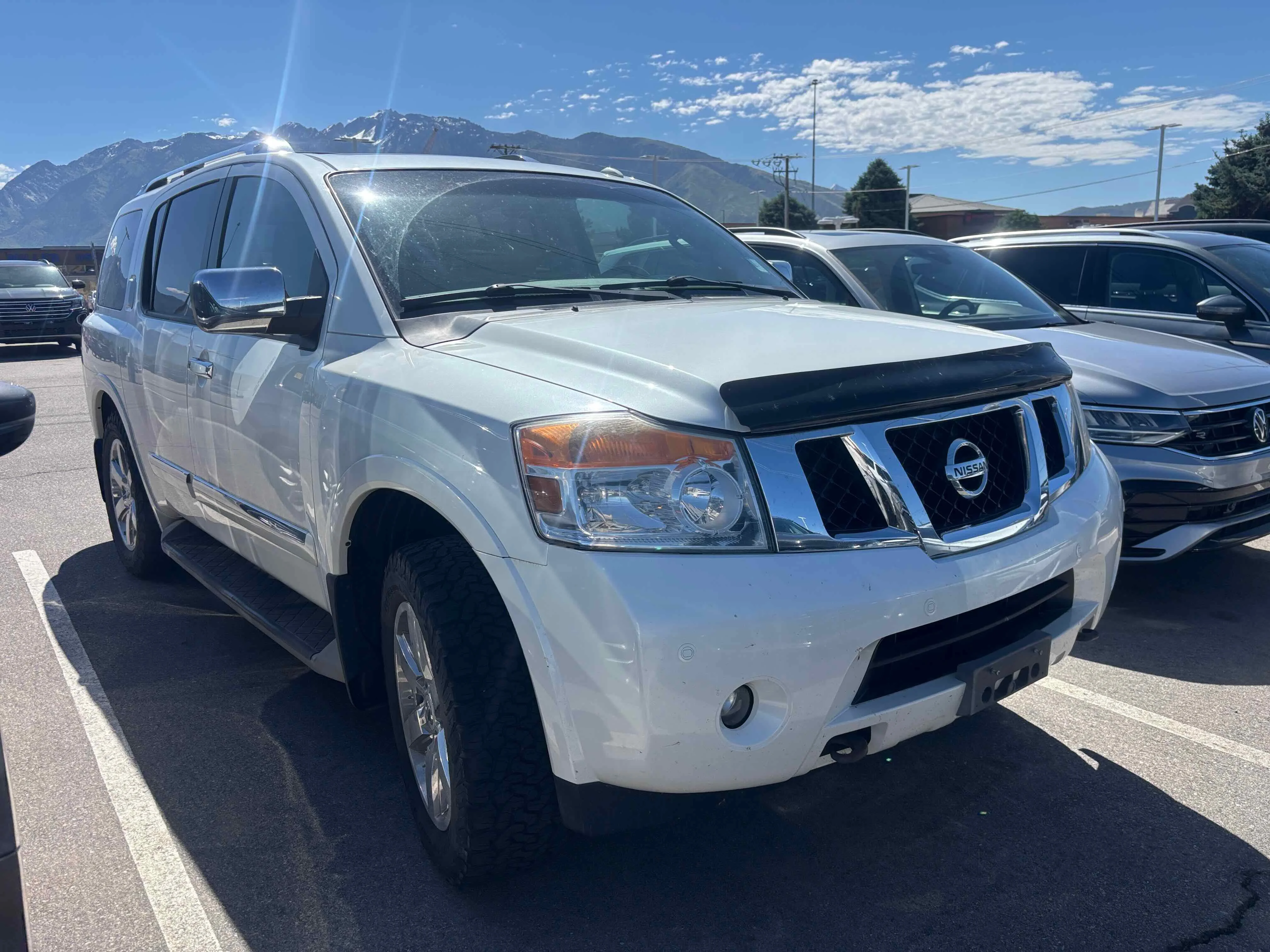 Used 2013 Pearl White Nissan Platinum image 3