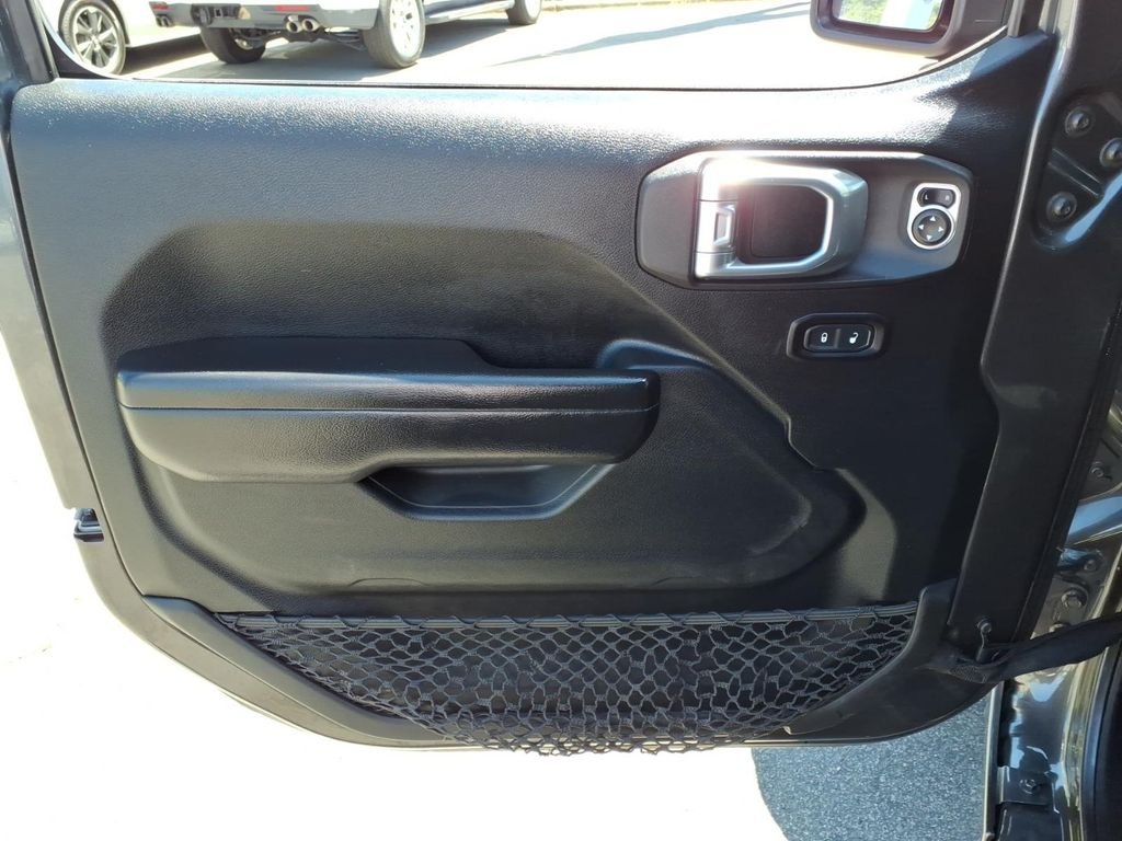 Used 2021 Crystal Metallic Jeep Sport image 6