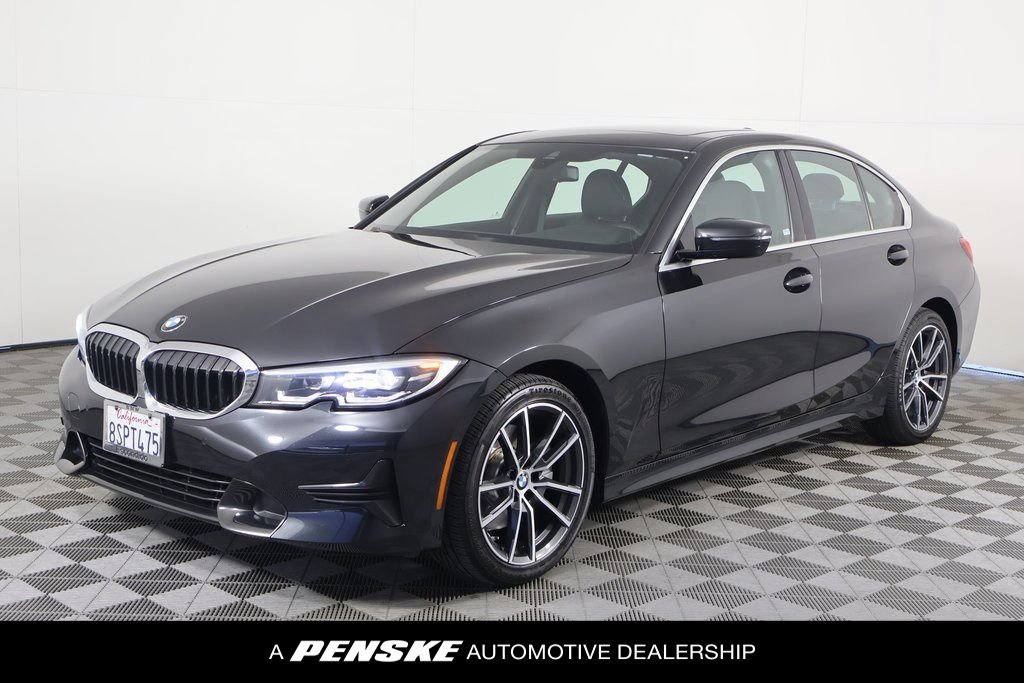 Used 2020 Black Sapphire Metallic BMW 330i image 1