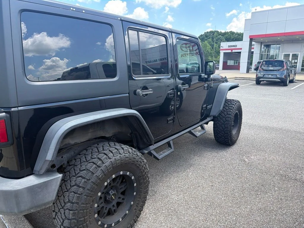 Used 2015 Black Jeep Unlimited Sport image 10