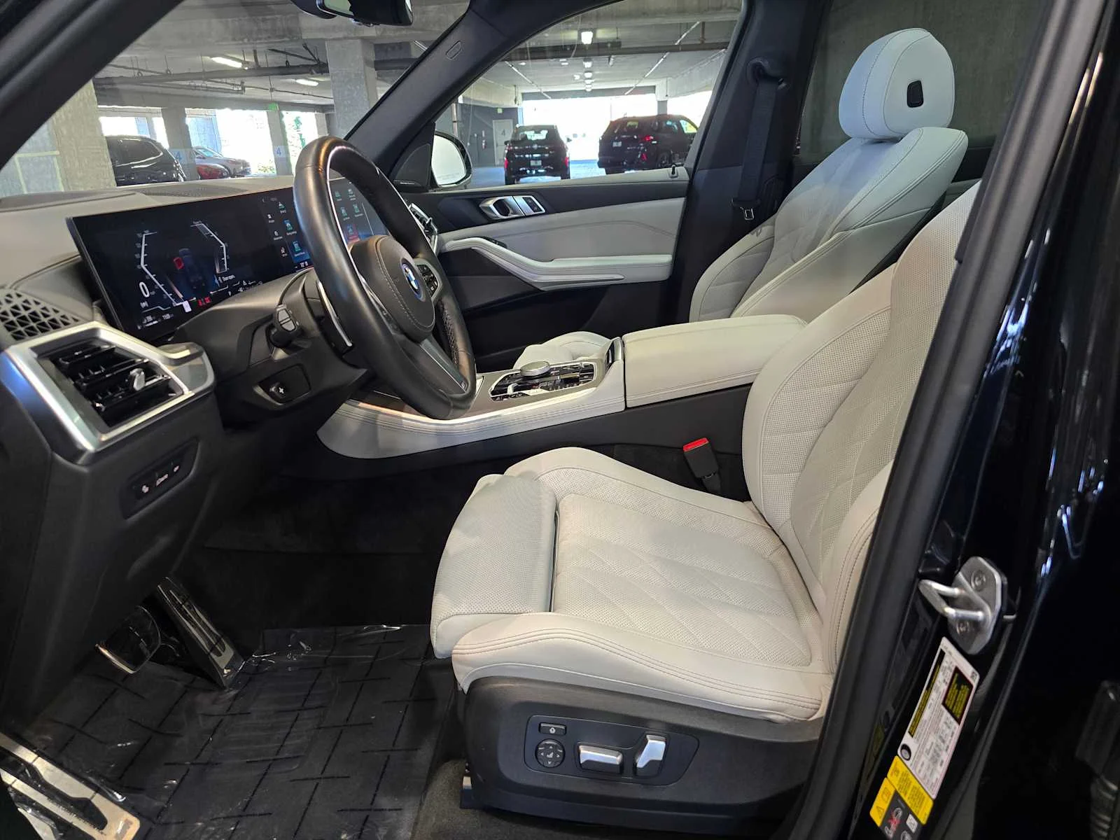 Used 2024 Black Sapphire Metallic BMW xDrive50e image 25