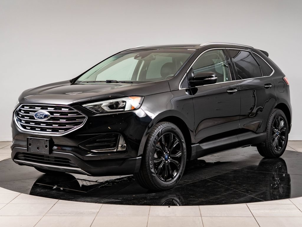 Used 2019 Agate Black Metallic Ford Titanium image 1