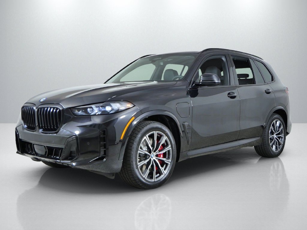 New 2026 Black Sapphire Metallic BMW xDrive50e image 1