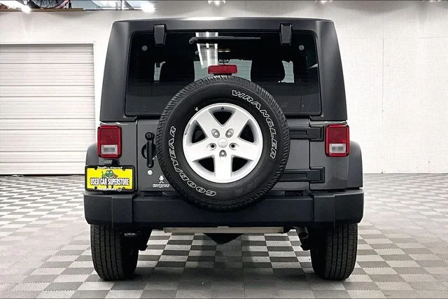 Used 2017 Granite Crystal Metallic Clearcoat Jeep Sport image 5