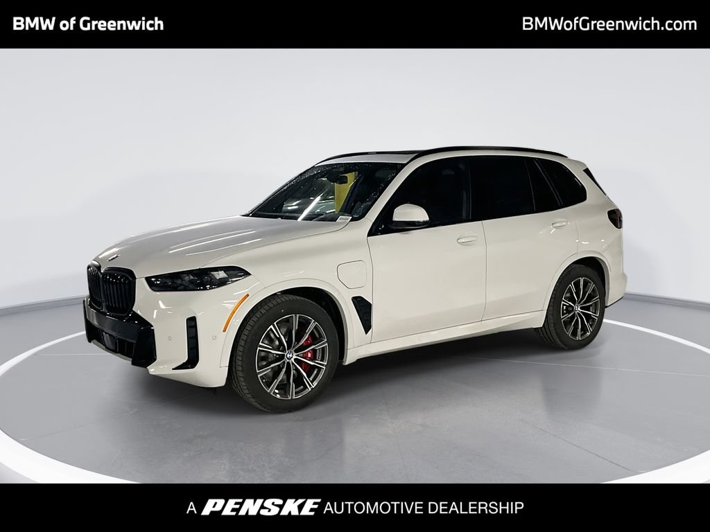 Used 2026 White BMW xDrive50e image 1