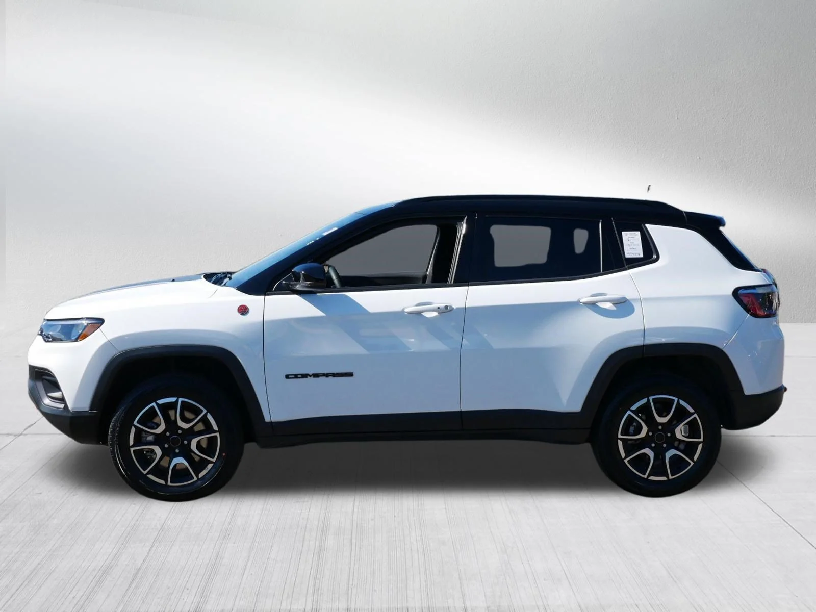Used 2025 Bright White Clearcoat Jeep Trailhawk image 4