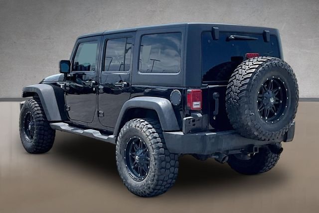 Used 2013 Black Clearcoat Jeep Unlimited Sport image 8