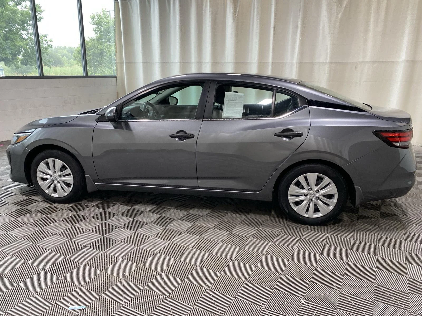 Used 2024 Gun Metallic Nissan S image 5