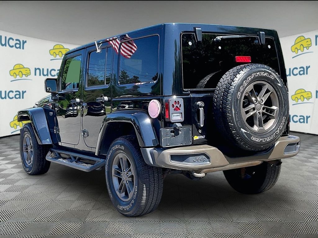 Used 2017 Black Jeep Unlimited Sahara image 4