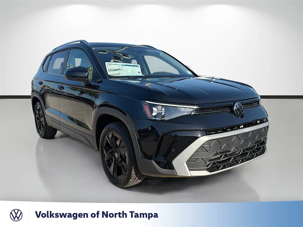 New 2026 Black Volkswagen SE image 1