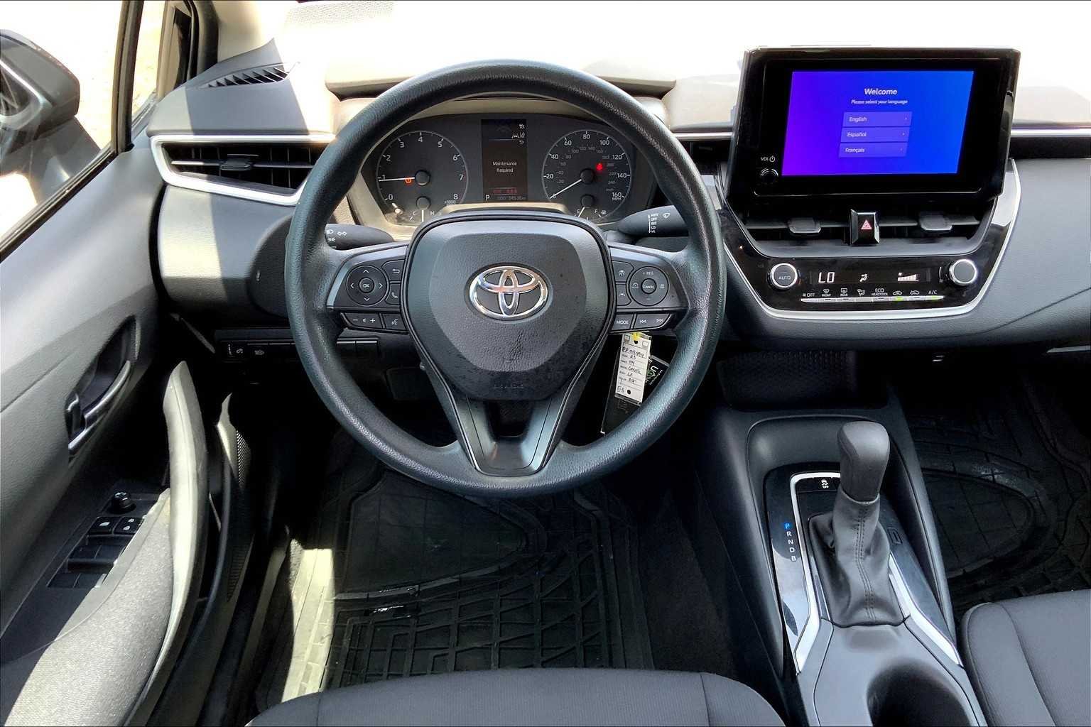 Used 2023 Midnight Black Metallic Toyota LE image 6