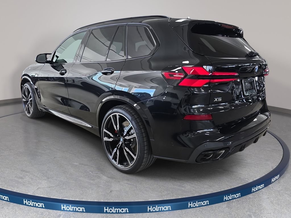 New 2026 Black Sapphire Metallic BMW M60i image 7