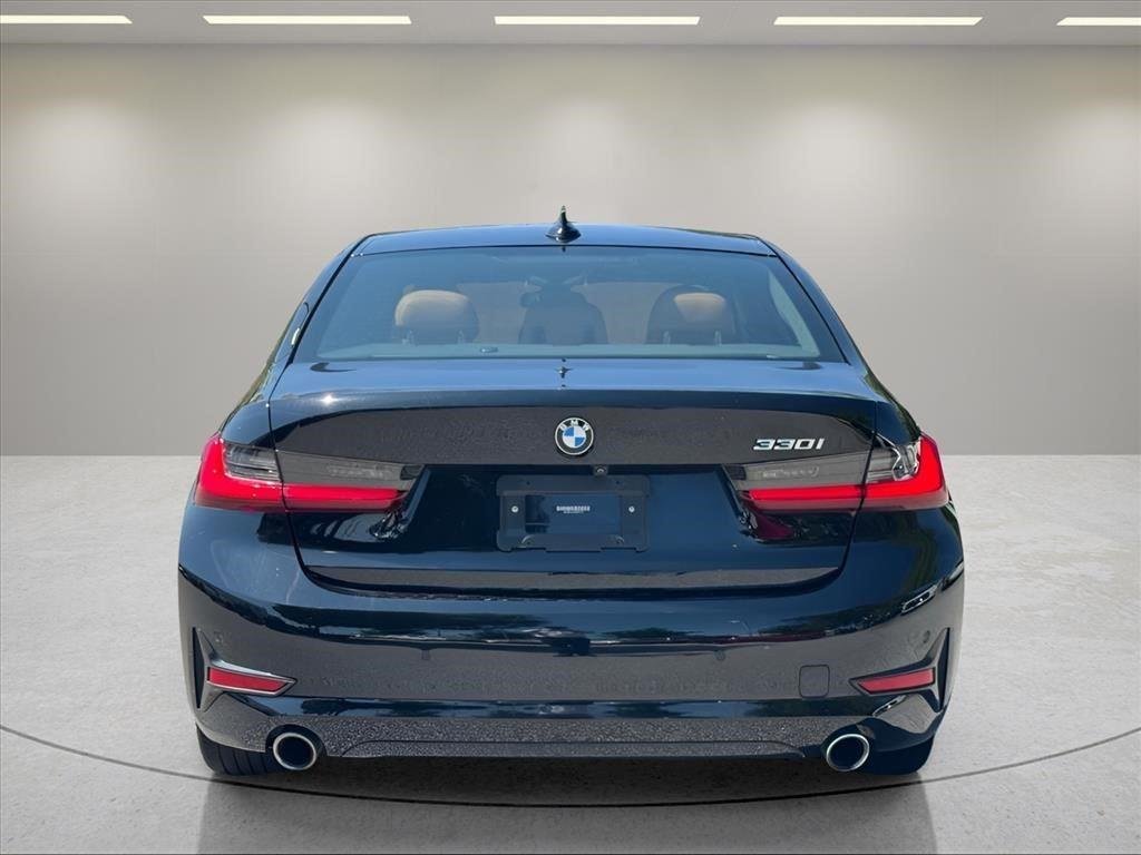 Used 2021 Portimao Blue Metallic BMW 330i image 4