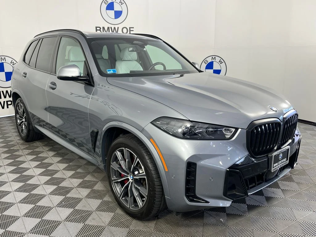 Certified Used 2024 Skyscraper Grey Metallic BMW xDrive40i image 1