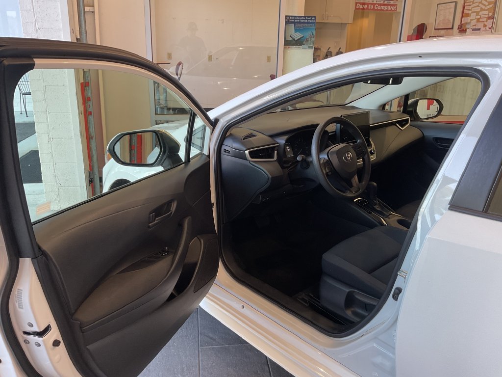Used 2025 White Toyota LE image 11