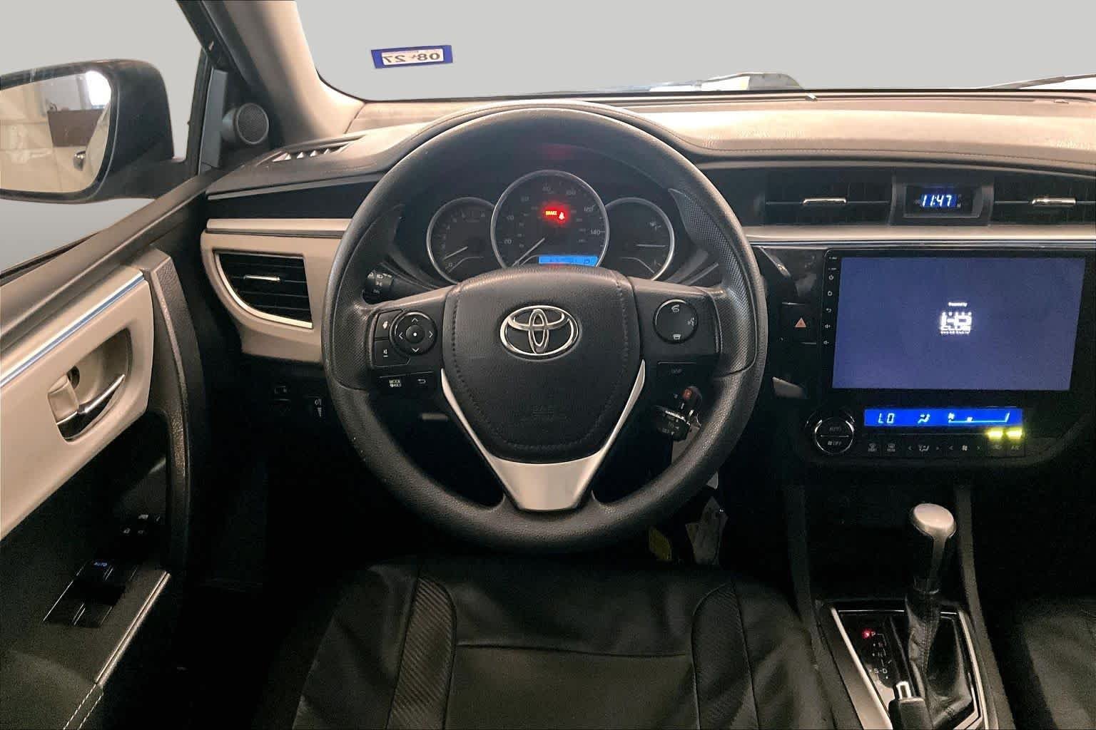 Used 2016 Black Sand Pearl Toyota LE image 16