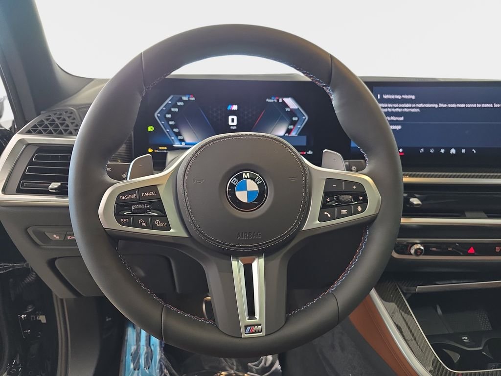 New 2026 Black Sapphire Metallic BMW M60i image 13